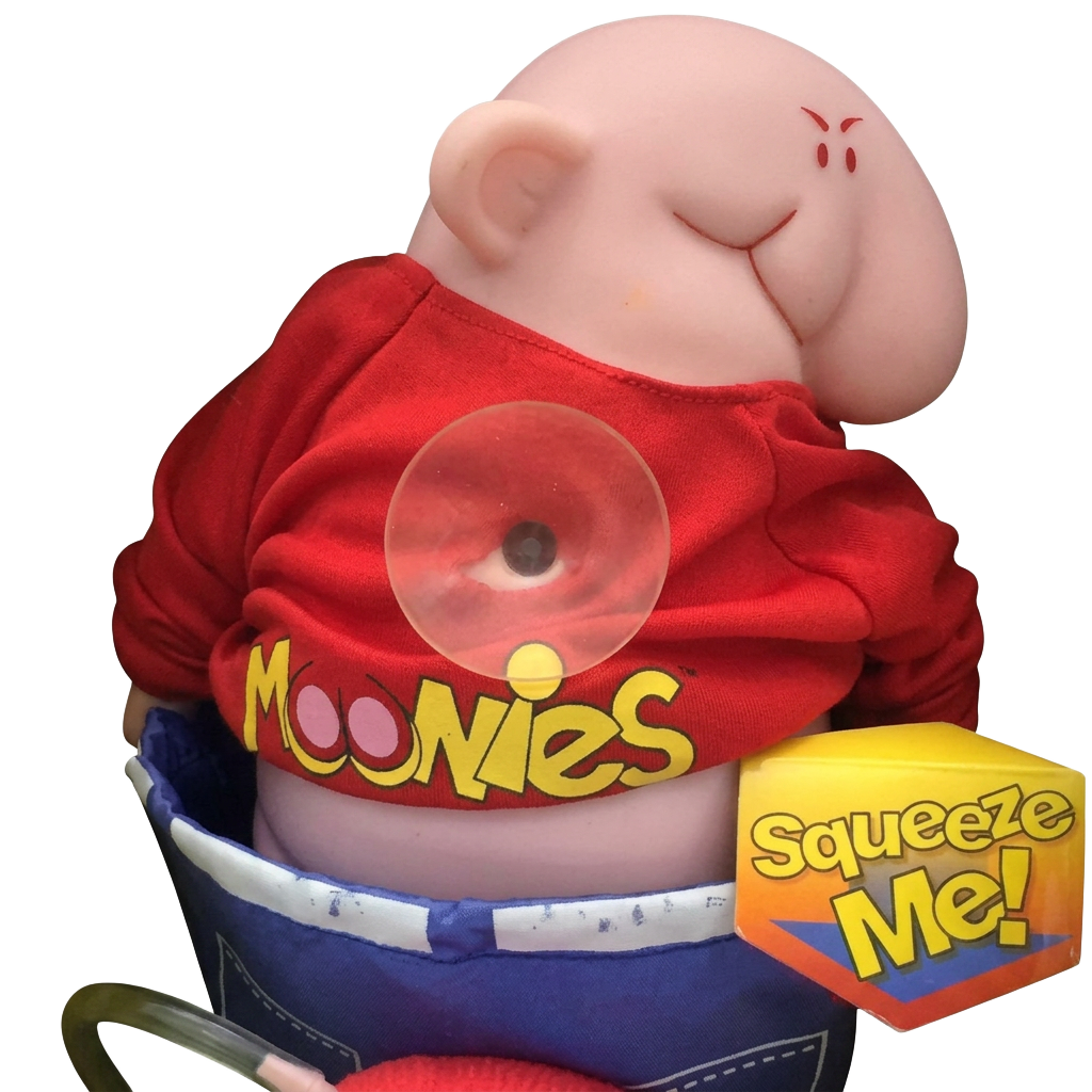 Moonies plush toy in red shirt and blue overalls
